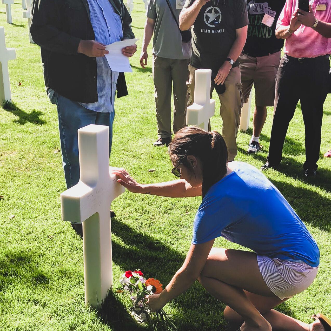 Nicole Finch visits grave on Band of brothers tour.jpg